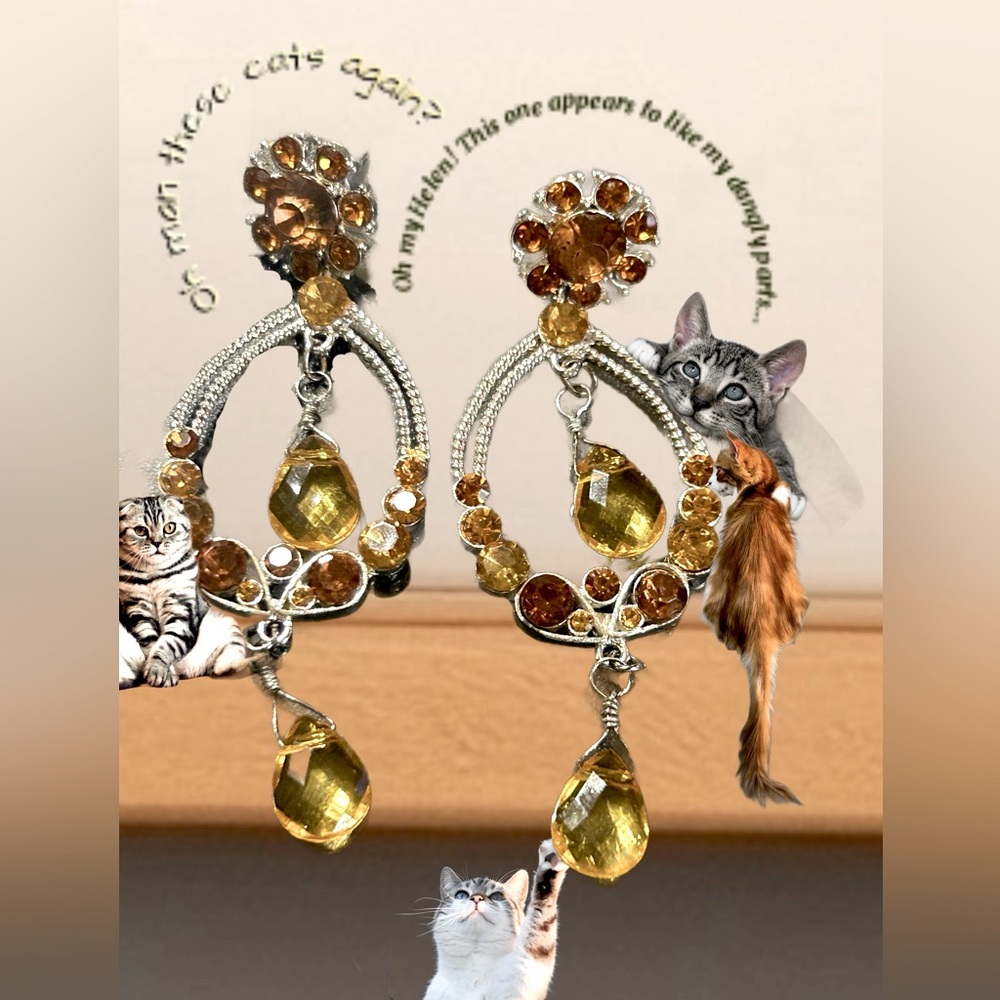 Dangly parts earrings, may attract tiny cats